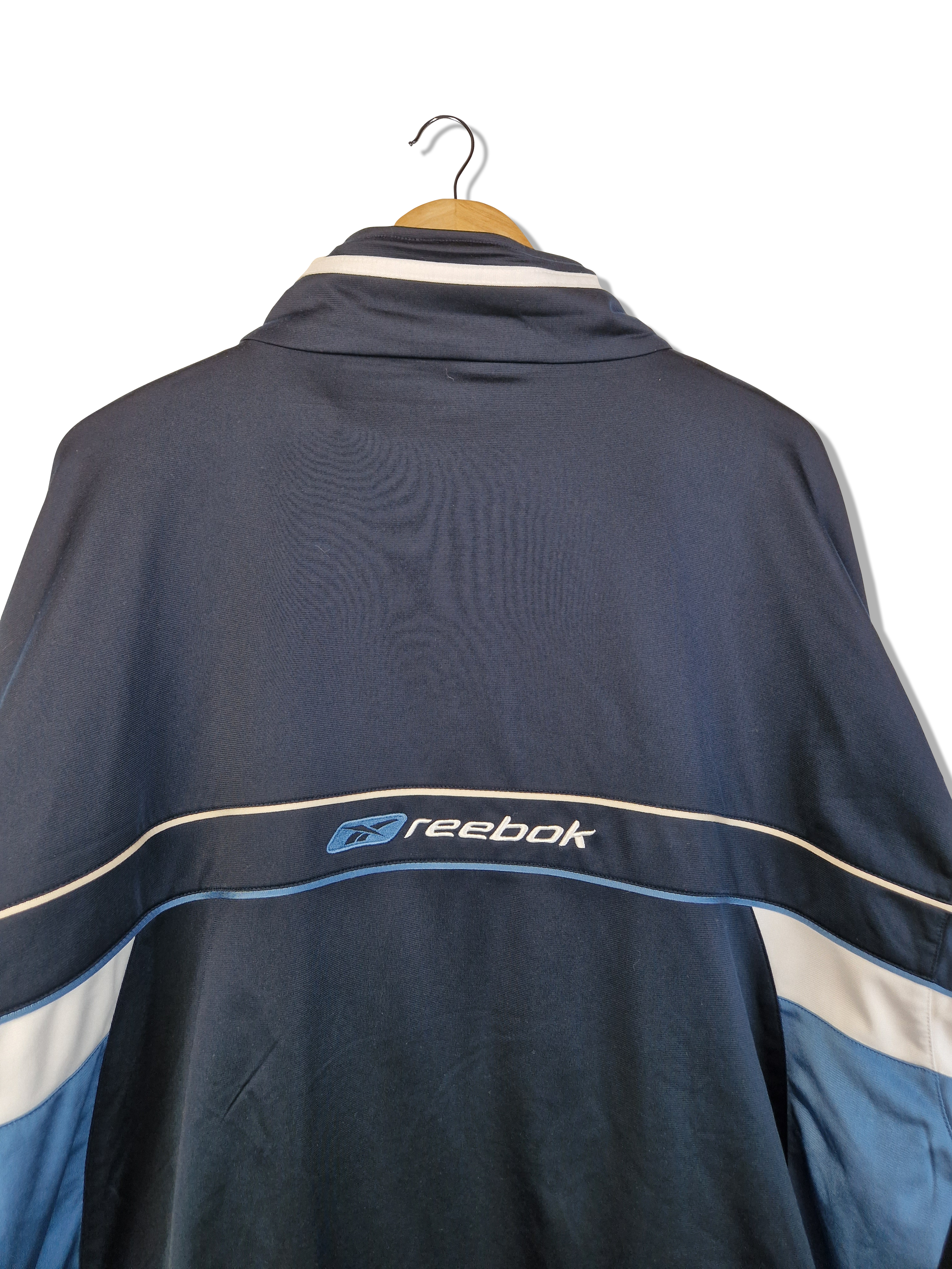 Vintage Reebok Sportjacke Gesticktes Spellout auf dem Rücken Dunkelblau Navy XXL