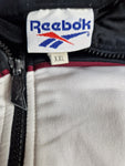 Vintage Reebok Sportjacke Großes Logo Auf Dem Rücken Weiß Schwarz XXL