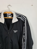 Vintage Reebok Sportjacke Logostreifen Schwarz Weiß XS