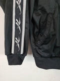 Vintage Reebok Sportjacke Logostreifen Schwarz Weiß XS